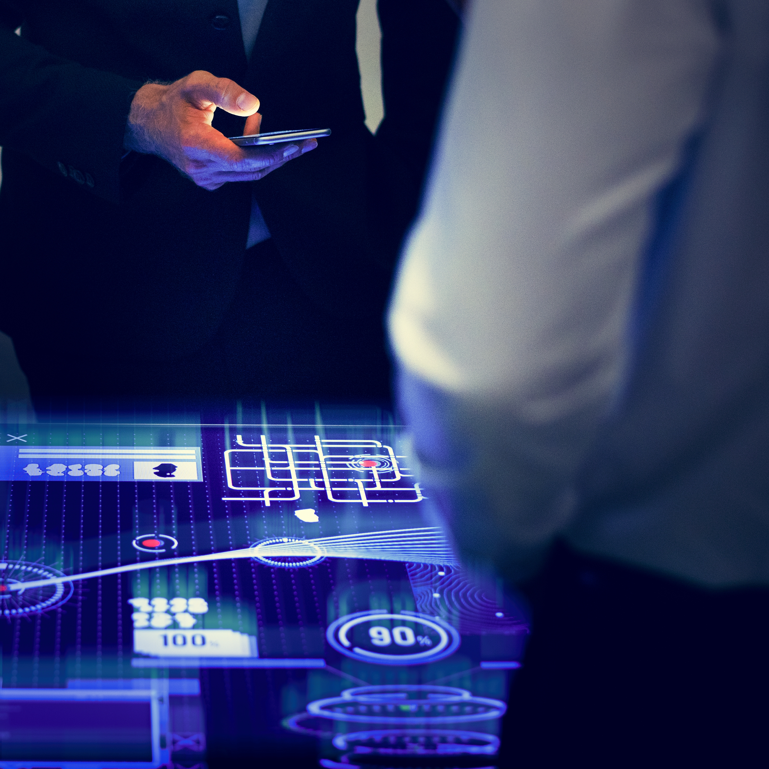 businessmen-analyzing-data-on-futuristic-holograph-2026-03-18-13-14-42-utc