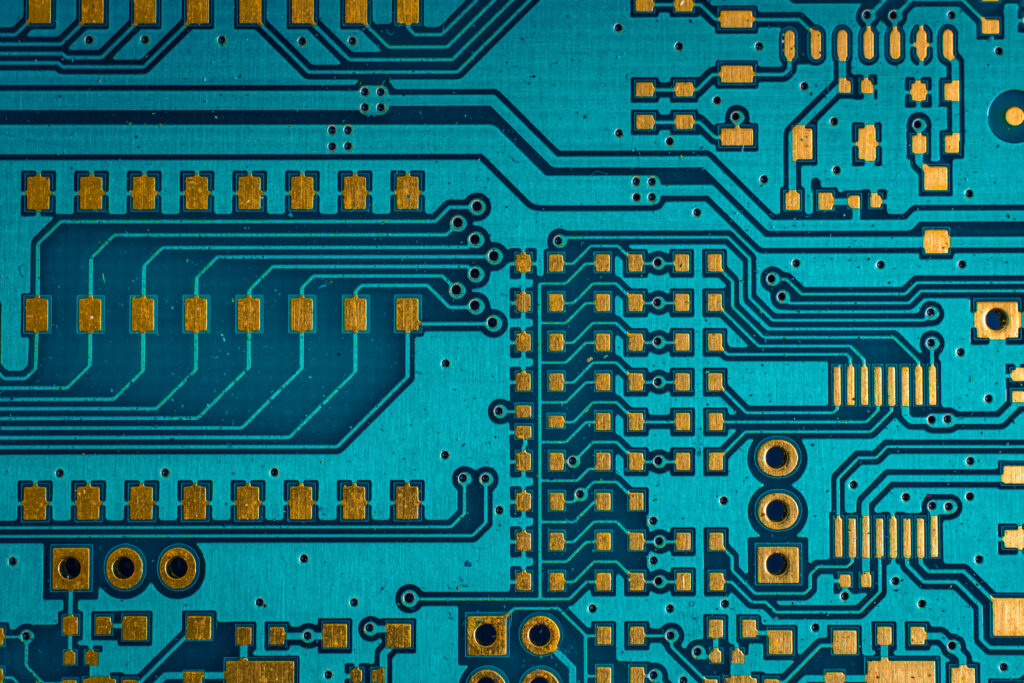 circuit-board-close-up-with-teal-and-gold-2026-03-25-08-55-44-utc