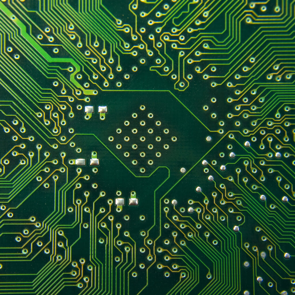 green-and-yellow-computer-circuit-board-close-up-2026-01-06-08-46-23-utc