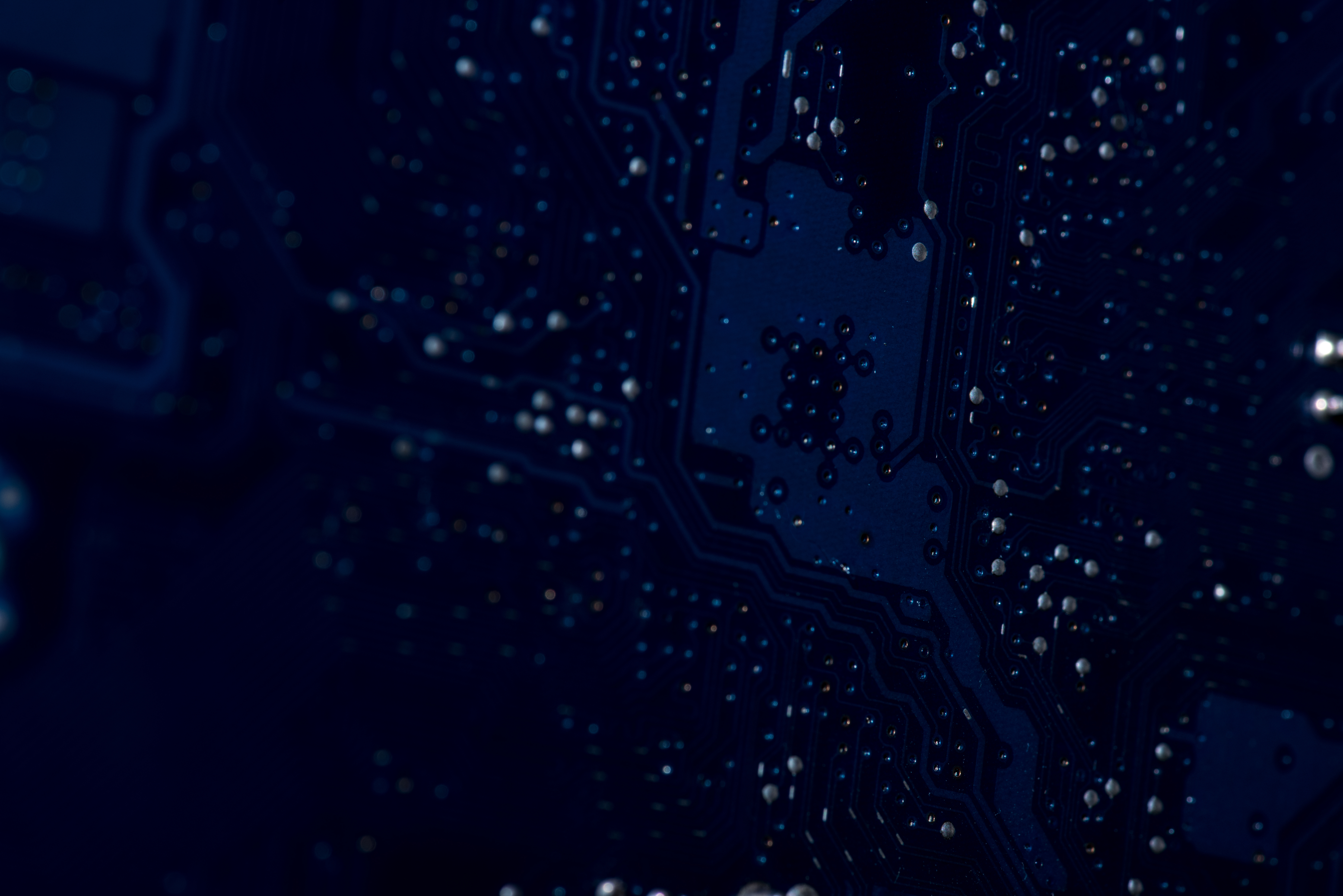 macro-shot-of-a-dark-blue-circuit-board-2026-03-13-01-23-05-utc